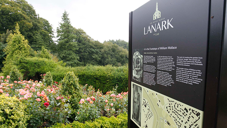 Lanark, as reflected here in signage at the entrance to Castlebank Park, will benefit from this week's decision.