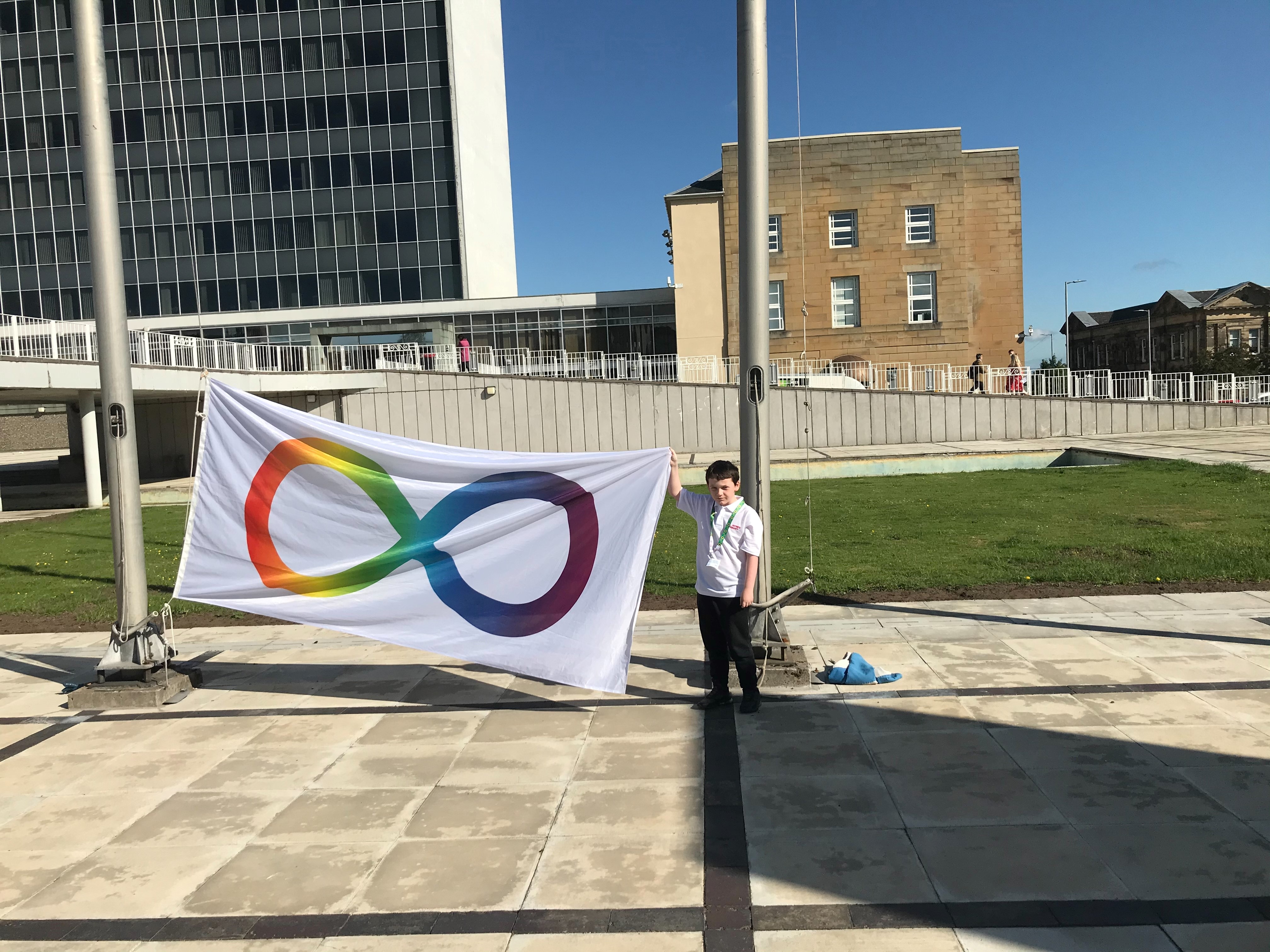Autism pride flag raised high at council HQ