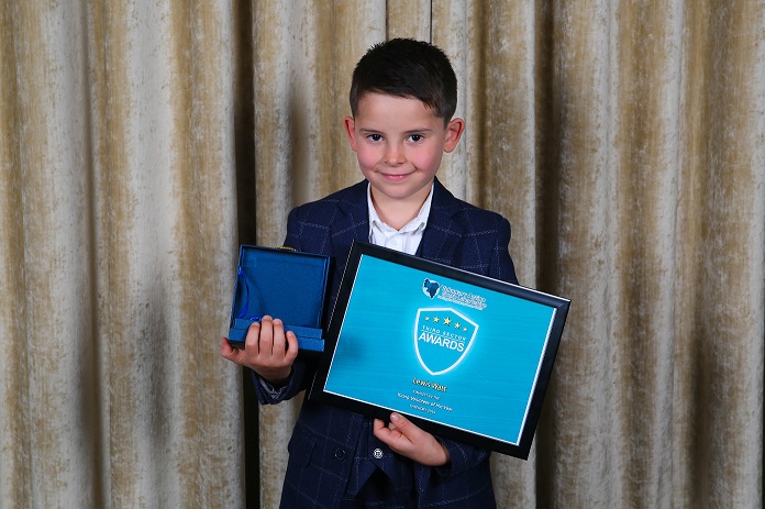 Sensational seven year old beats off veteran volunteers to land coveted achievement award  