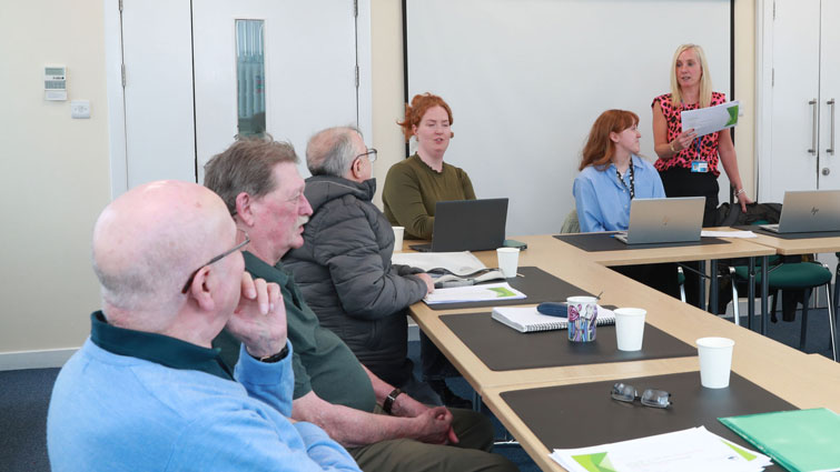 This image shows discussions taking place during the annual rent setting consultation 