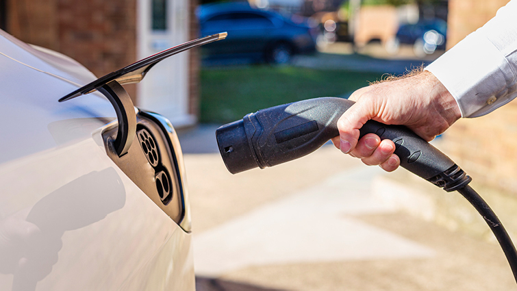 This image shows an Electric Vehicle being charged