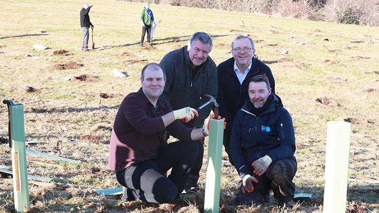 This image shows Councillor Mark McGeever with volunteers during the planting of trees as part of the Clyde Climate Forest