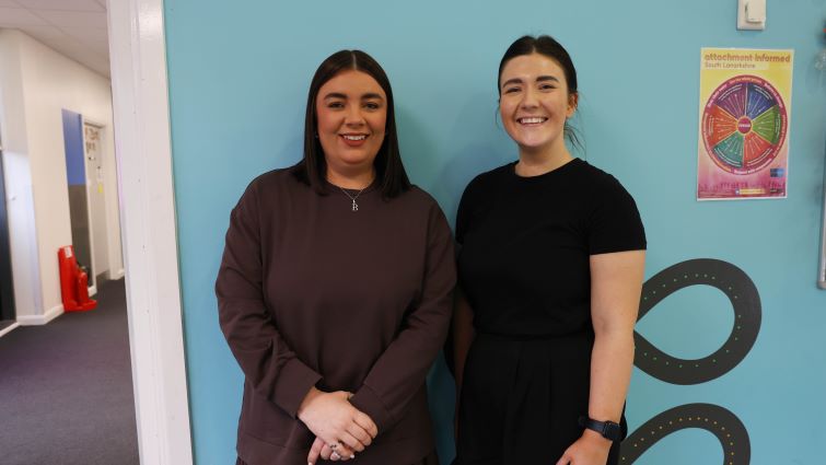 Nurture development officer Kayleigh Crawford and class teacher Rebecca May stand together in the school.