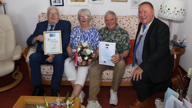 This image shows Bill and Jean Barr with Depute Provost Bert Thomson and Deputy Lord Lieutenant David Russell on their 65th wedding anniversary