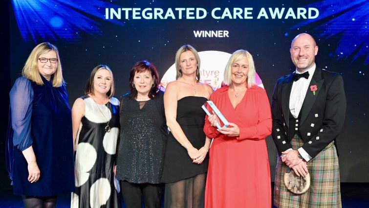 This image shows representatives of Blantyre Life accepting the Integrated Care Award at Scotland’s Health Awards 2025
