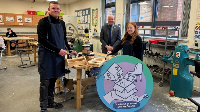 This image shows some of the young people attending the after-school craft class at Calderglen High School with a teacher