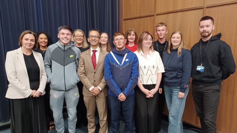 This image shows various people who attended a conference to tackle knife crime and youth violence