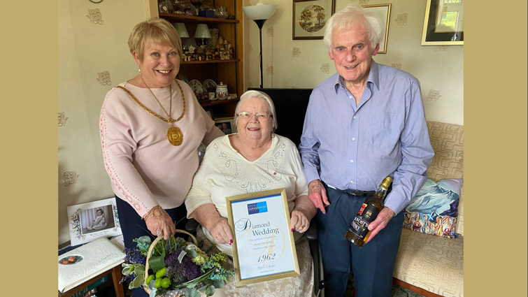 Provost Margaret Cooper with Jim and Pat Bolton, from Burnside, who celebrated their diamond wedding anniversary.