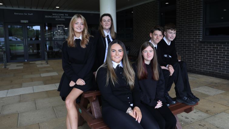 This image shows a group of Duncanrig Secondary pupils who are taking non-traditional routes to success