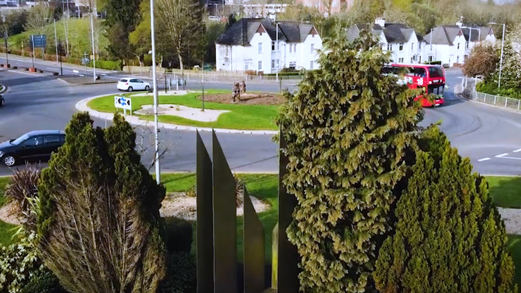 This image shows a still from the EK@75 film of a roundabout in the town