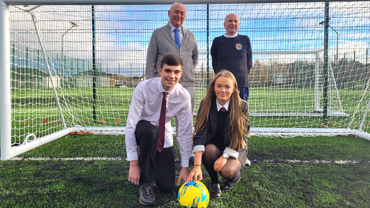 Two Trinity High pupils with Chair of the Community and Enterprise Resources Committee, Councillor John Anderson, and chair of South Lanarkshire Leisure and Culture, Councillor Peter Craig, at Eastfield Lifestyles Centre