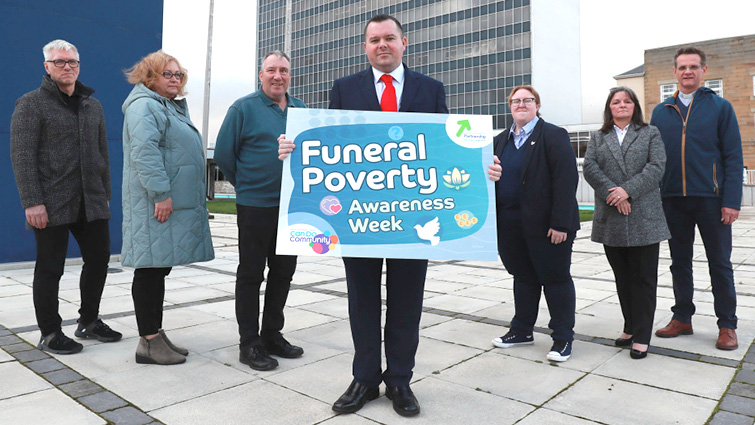 This image shows council leader Joe Fagan with members of the Financial Inclusion Network at the launch of Funeral Poverty Awareness Week