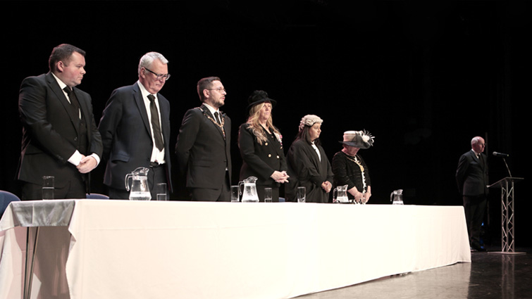 This image shows Council Leader Joe Fagan and Provost Margaret Cooper along with other dignitaries at a special ceremony for the local Proclamation of the new King Charles III