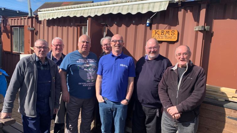 This image shows members of the Kirkmuirhill and Blackwood Men’s Shed