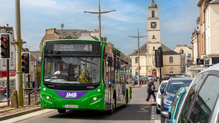 bus going up Lanark High Street