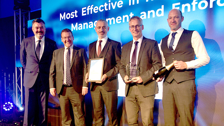 This image shows roads employees collecting their award at the Scottish Transport Awards