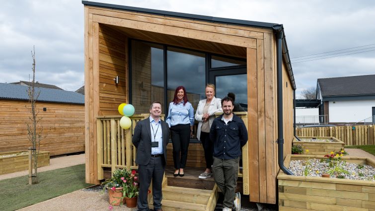 This image shows the council's chief executive Paul Manning, head of housing services Sharon Egan, Karen Good from Salvation Army and Josh Littlejohn from Social Bite at the opening of Harriet Gardens homelessness village
