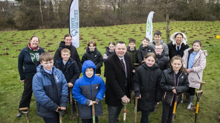 This image shows Council Leader Joe Fagan with pupils from High Blantyre Primary School and community workers