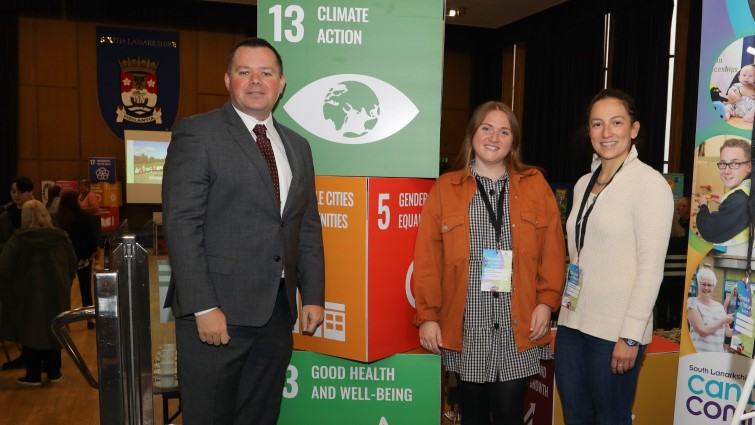This image shows council leader Joe Fagan with two of the facilitators at the Climate and Nature event