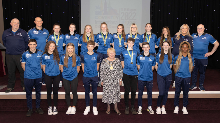 This image shows the ICG team with Provost Cooper at a civic reception to mark their achievements at the Games