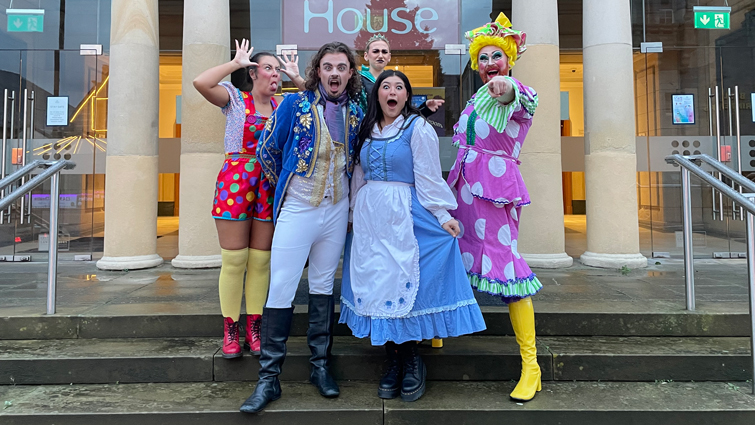 This image shows the cast of Beauty and the Beast outside Hamilton Town House