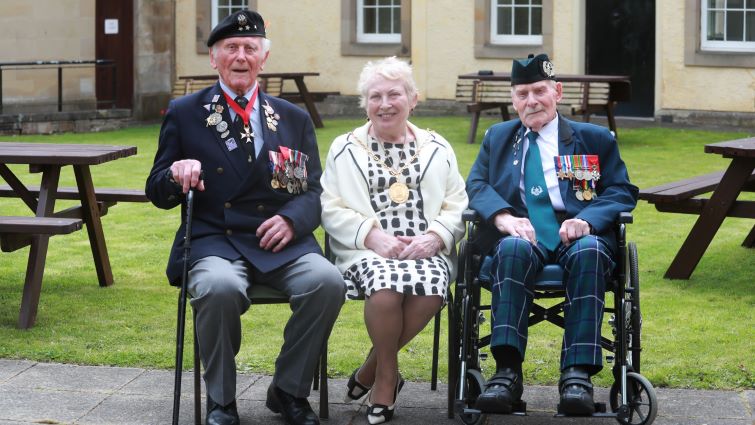 Don Turrell (right) with Provost Margaret Cooper and Eugeniusz Niedzielski (104).
