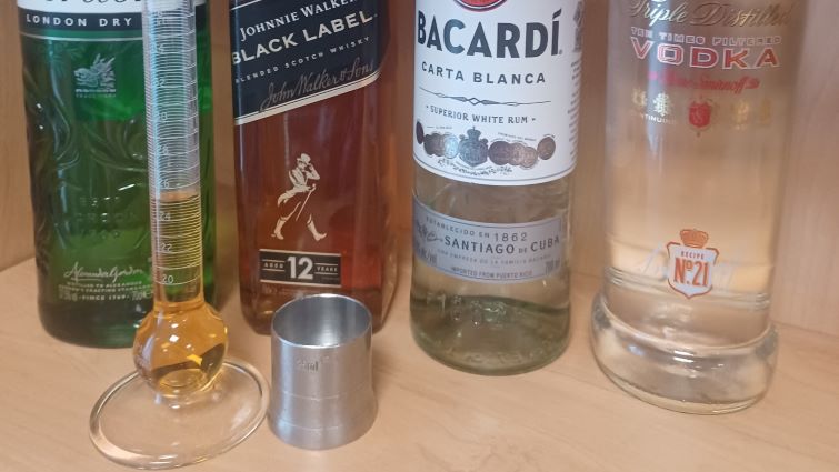 Spirits bottles and bar equipment for measures.